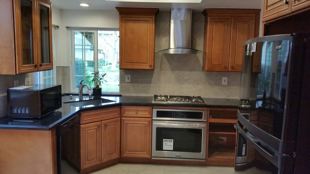 Newly remodeled kitchen with new cabinets, luxury appliances, and granite countertops